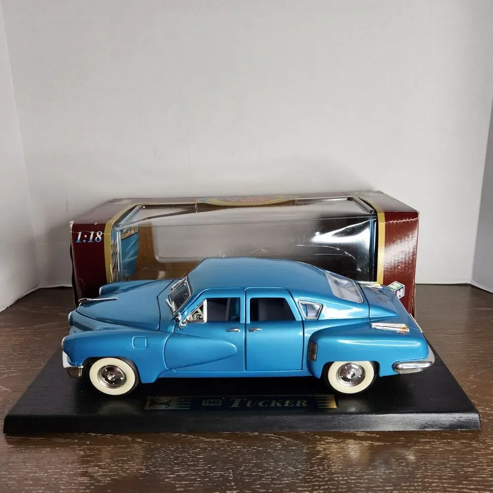 Road Legends 1948 Aqua Blue Tucker 1:18 Diecast Car # 92268 With Box and Stand
